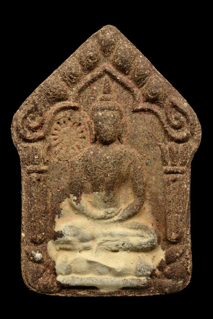 Khun Paen amulet with Buddha image (Picture credit: BkPoop Photo/ Shutterstock.com)